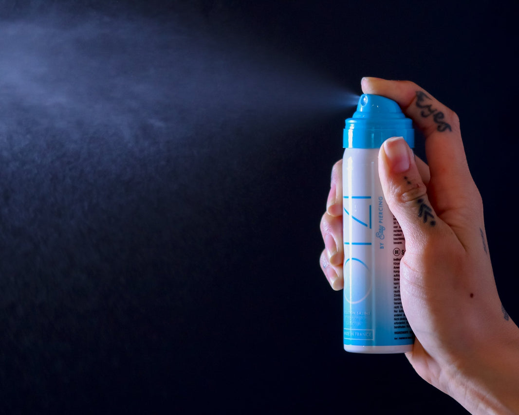 Saline solution spray for fresh piercings